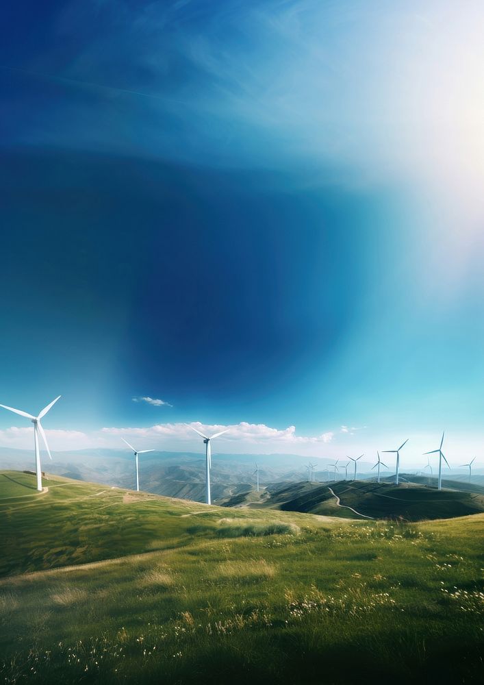 Wind turbines on mountain background. 