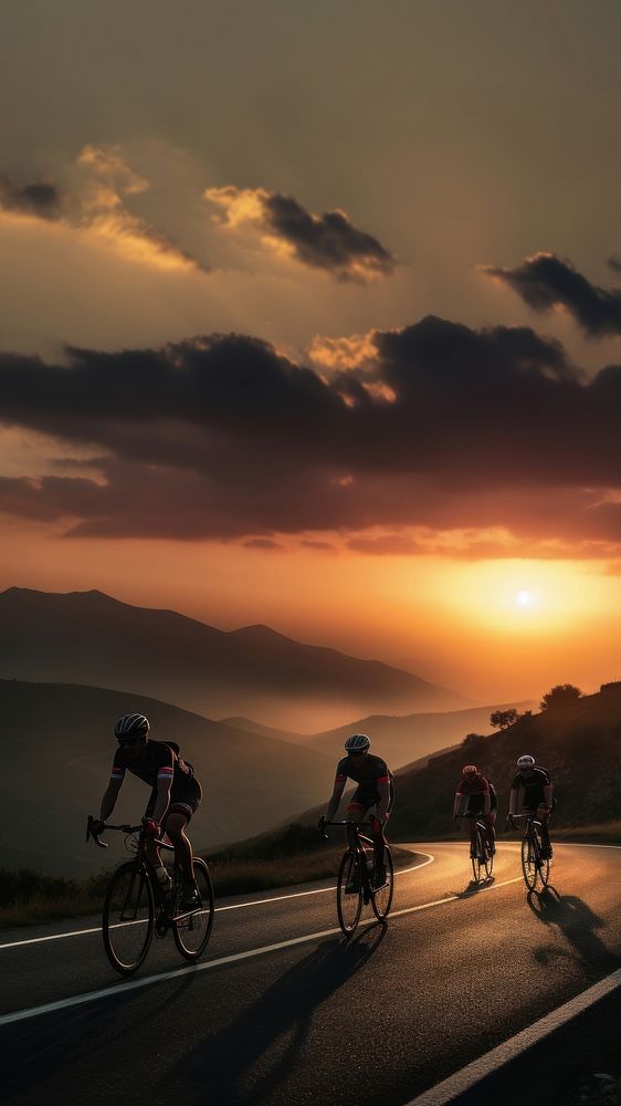 side view Photo of 3 man bicycling on the mountain road, sunset. AI generated Image by rawpixel. 