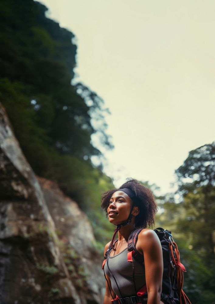 Photo of a african american female hikier go rock climbing. AI generated Image by rawpixel.