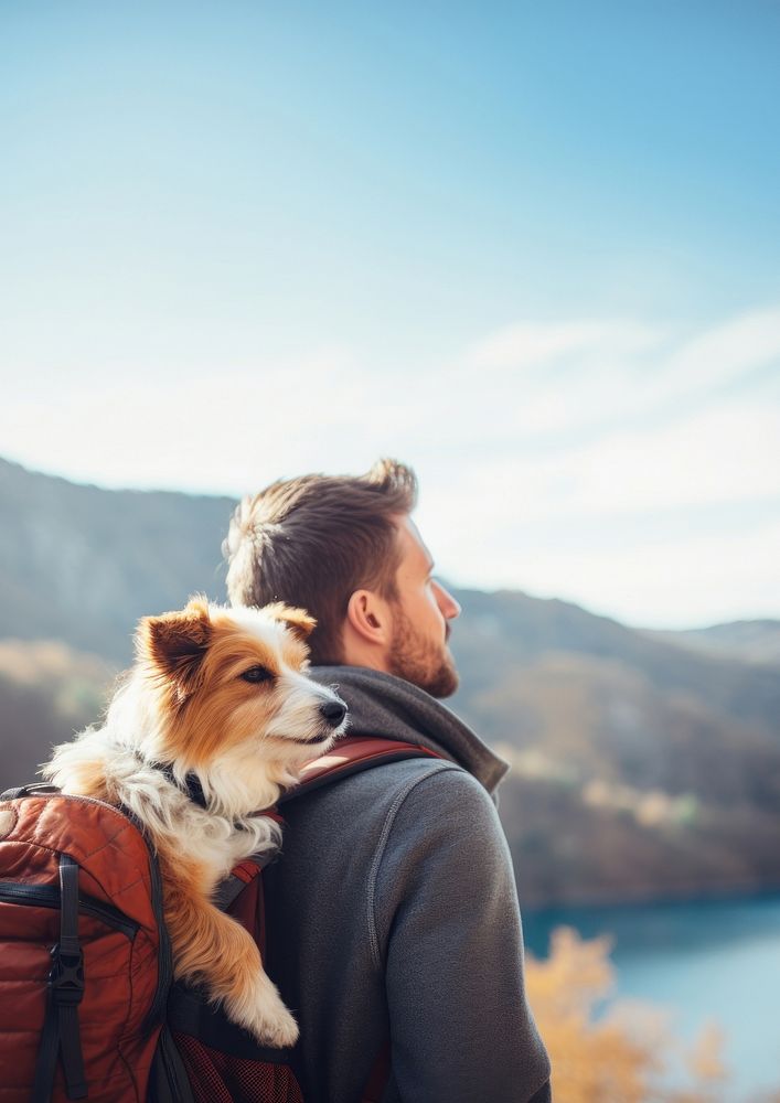 Photo of man travelling with his dog in a backpack. AI generated Image by rawpixel.