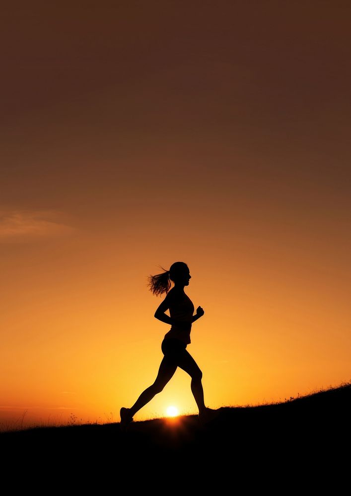 photo of silhouette woman run on the hill with sunset. 