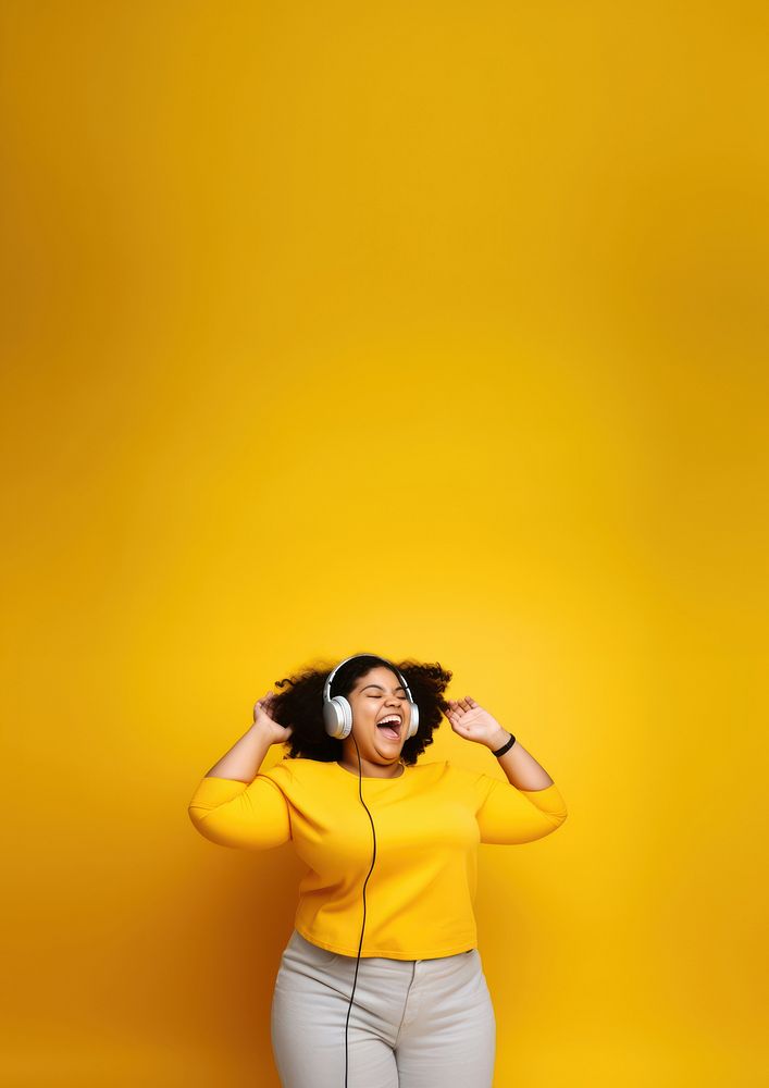 photo of a happy chubby woman wearing earphones. AI generated Image by rawpixel. 