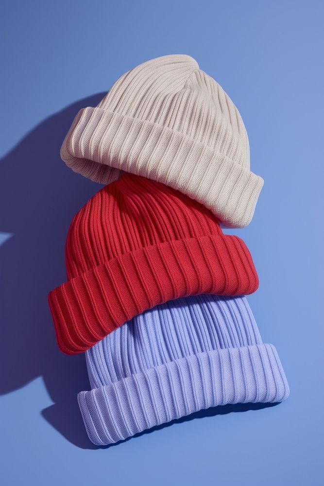 Beanies blue red headwear. AI generated Image by rawpixel.