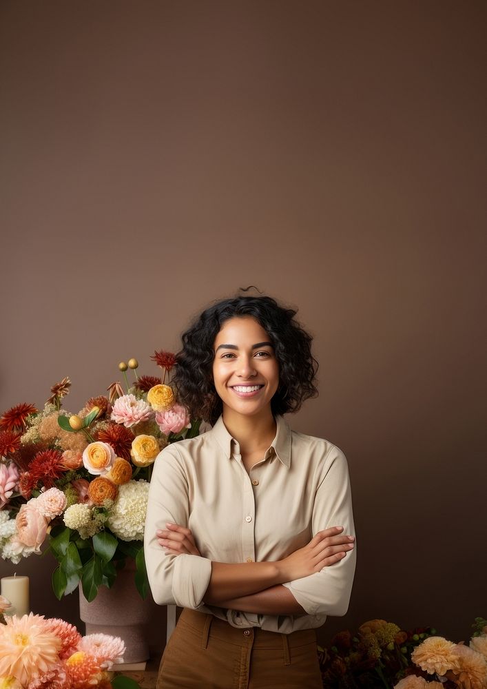 photo of a smiling florist looking at the camera studio shot isolated on a solid background. AI generated Image by rawpixel. 