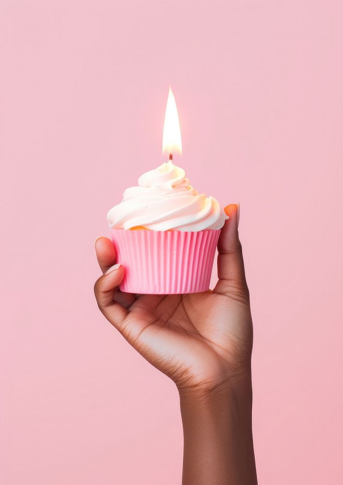 Cupcake candle dessert food. AI generated Image by rawpixel.