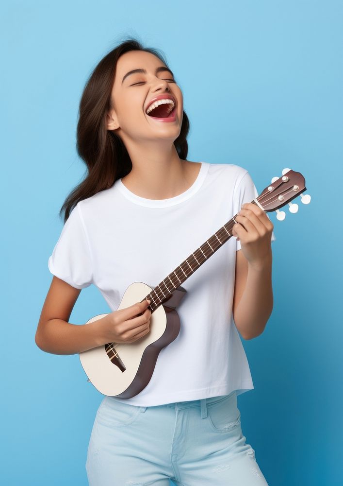 Musician guitar blue joy. AI generated Image by rawpixel.