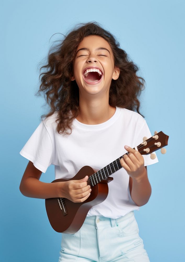 Laughing musician guitar blue. AI generated Image by rawpixel.