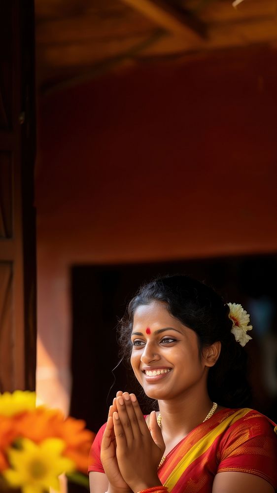 Sri Lankan woman performing a traditional welcoming gesture. AI generated Image by rawpixel. 