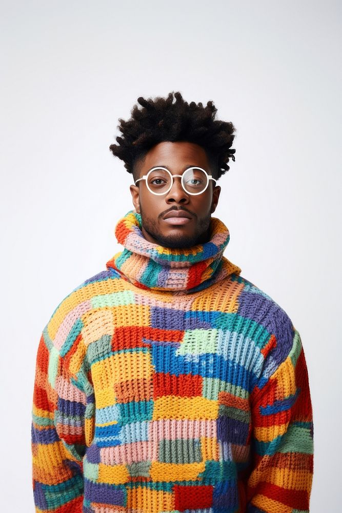 Wearing colorful sweater glasses face white background. 