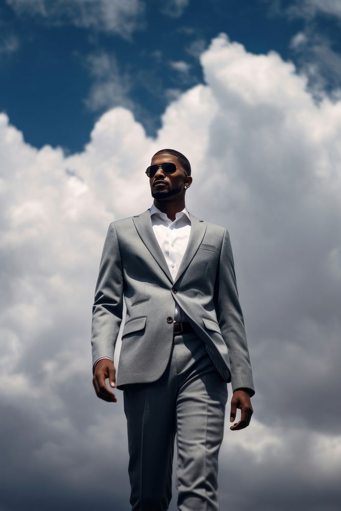 Black man cloud sky photography. AI generated Image by rawpixel.