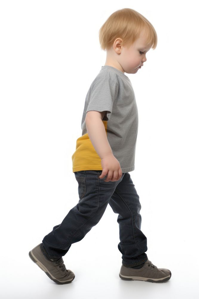 A chubby boy walking footwear standing. AI generated Image by rawpixel.