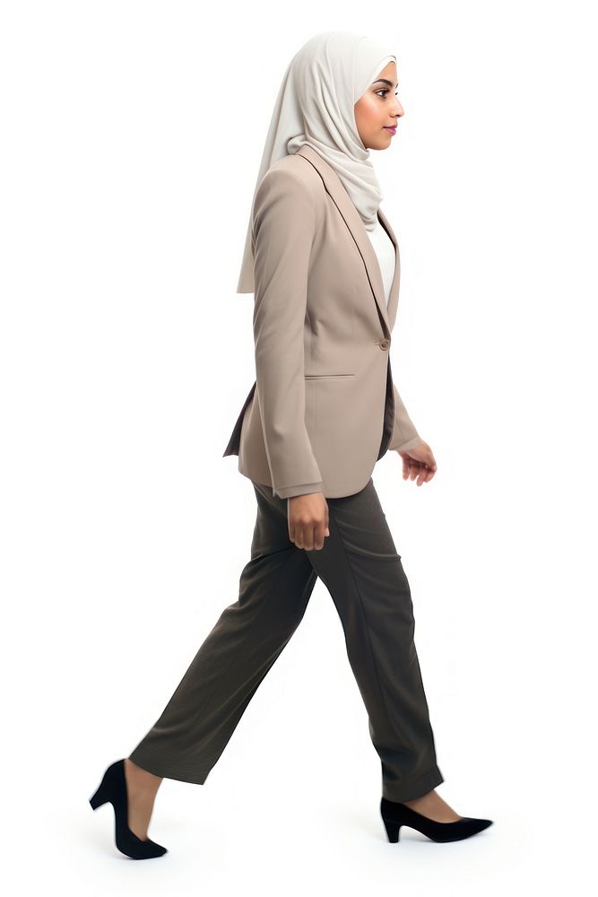 A muslim business woman walking footwear standing. AI generated Image by rawpixel.
