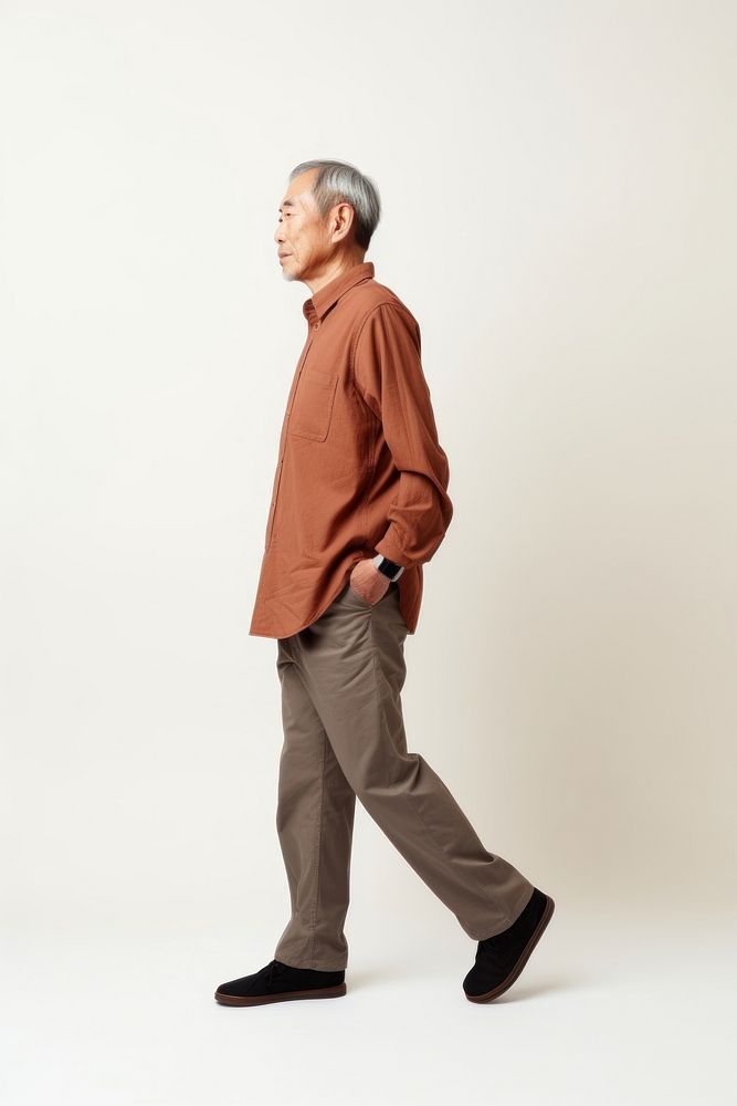 A senior asian man portrait standing walking. AI generated Image by rawpixel.