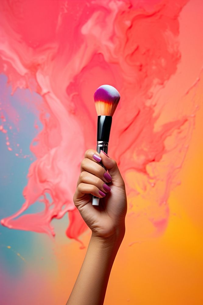 Hand holding makeup brush cosmetics  Free Photo - rawpixel