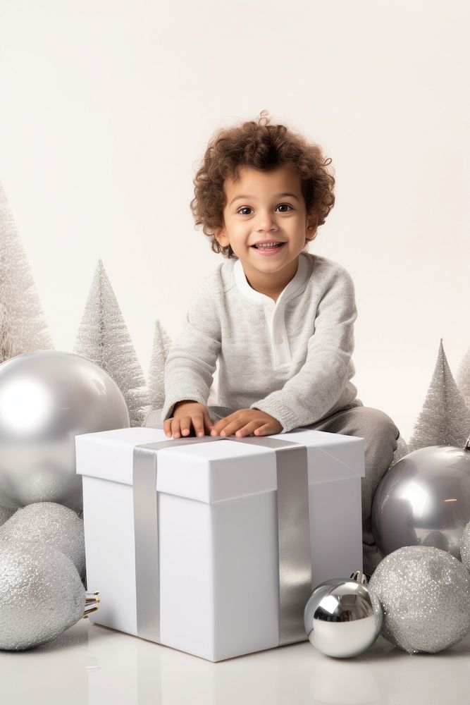 Christmas time sitting child white. AI generated Image by rawpixel.
