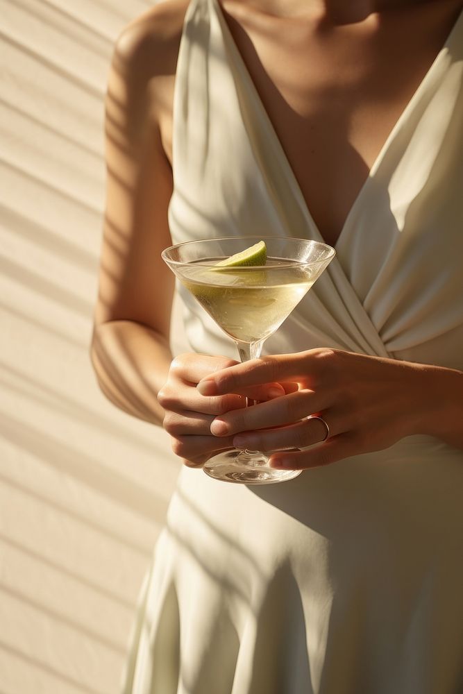 Martini cocktail fashion holding wedding. AI generated Image by rawpixel.