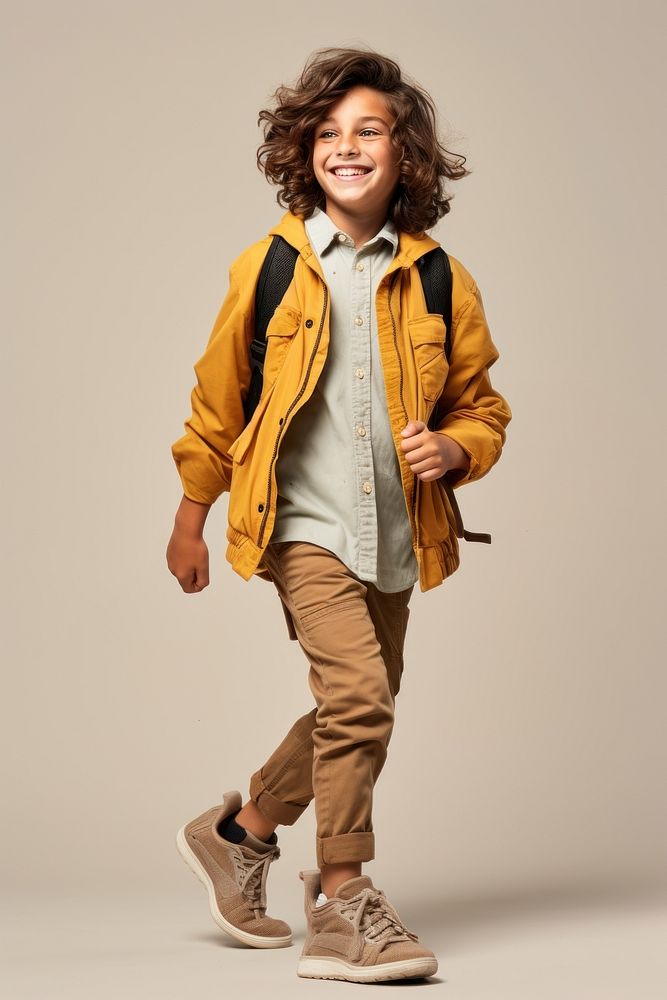 A happy student kid footwear jacket khaki. AI generated Image by rawpixel.