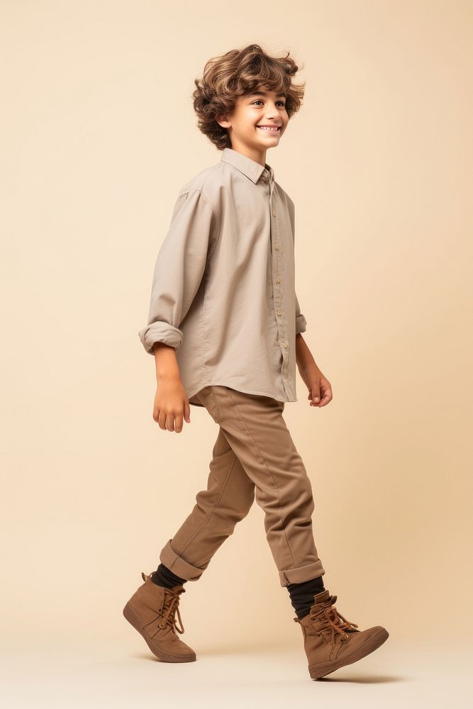 A happy student kid footwear child khaki. AI generated Image by rawpixel.