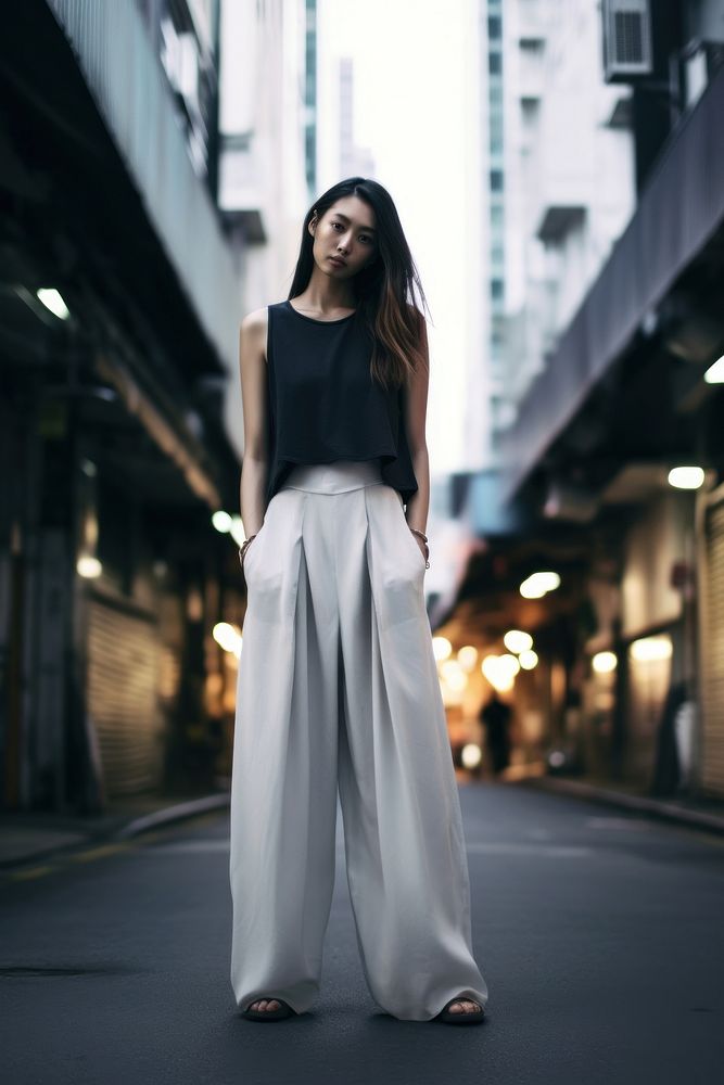Woman standing fashion street. AI generated Image by rawpixel.