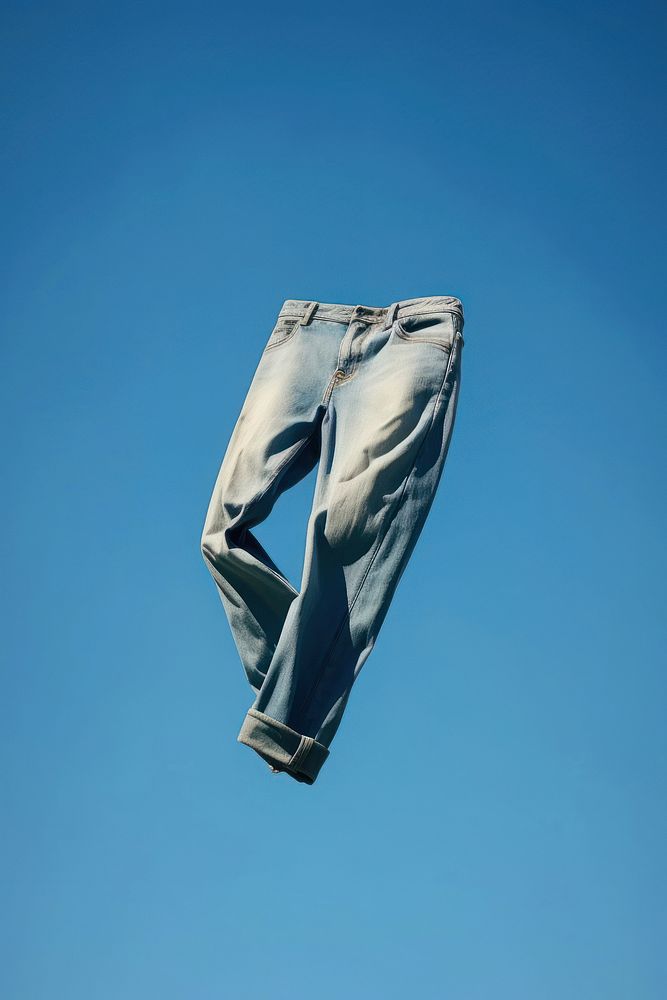 Jeans sky parachuting windsports. AI generated Image by rawpixel.