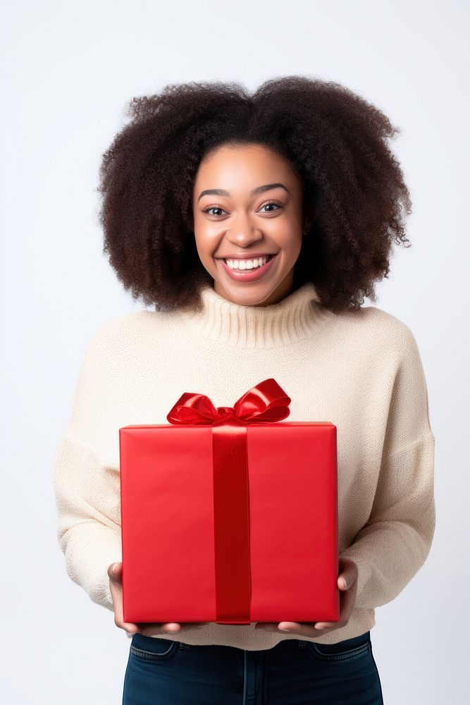 Girl holding Christmas gift christmas adult white background. AI generated Image by rawpixel.
