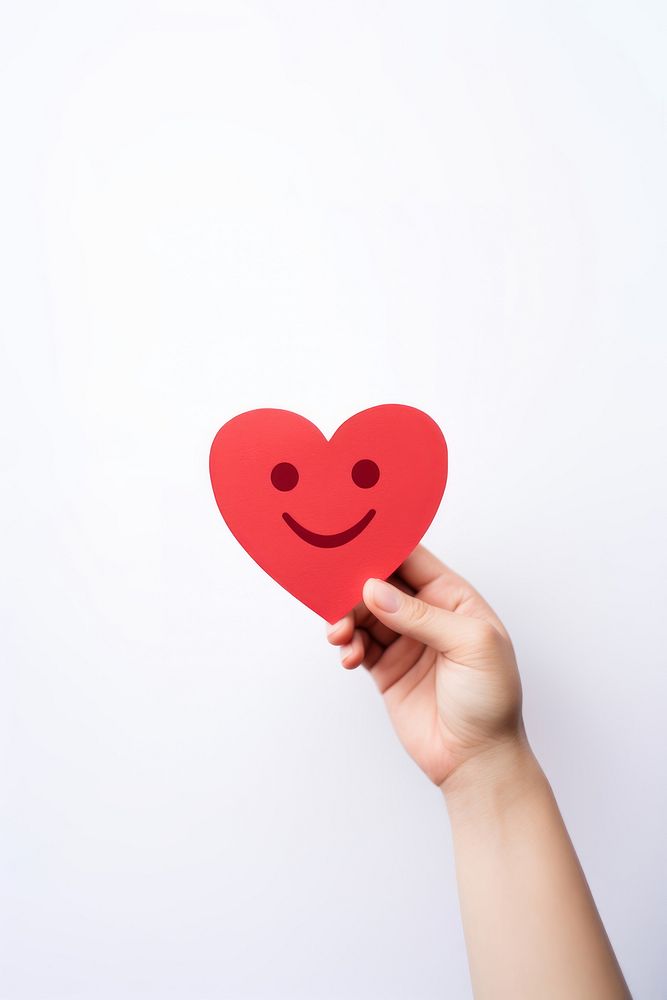 Smile face holding heart hand. AI generated Image by rawpixel.
