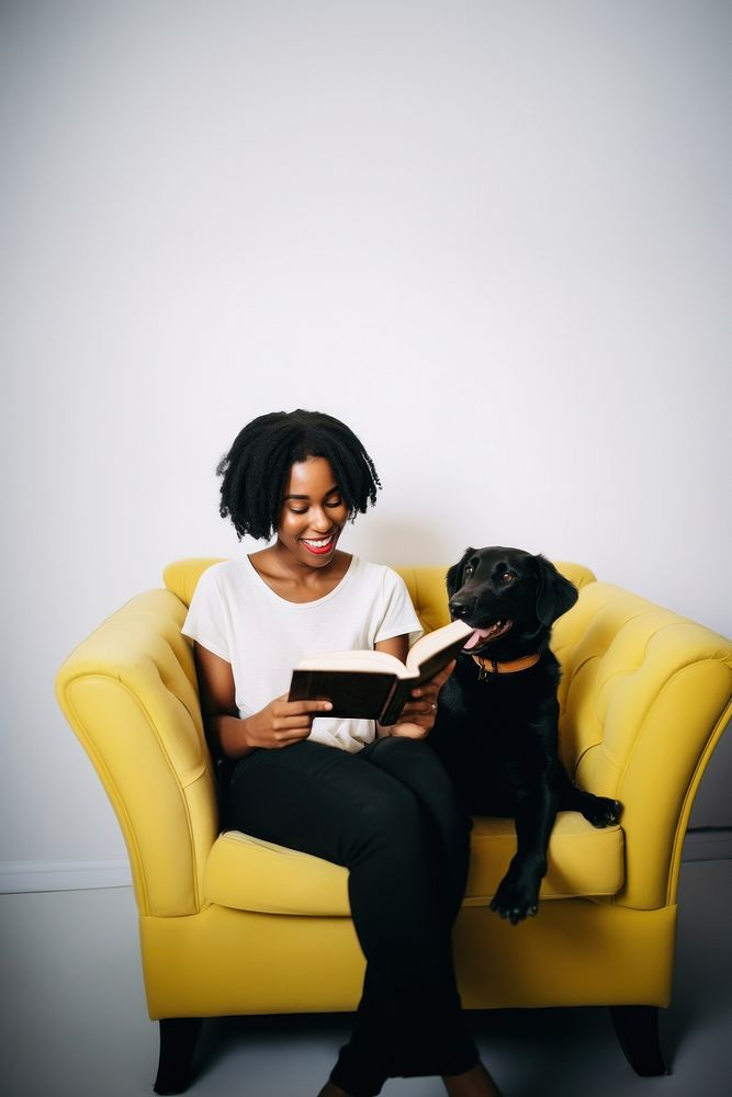 Woman reading a book sitting dog furniture. AI generated Image by rawpixel.