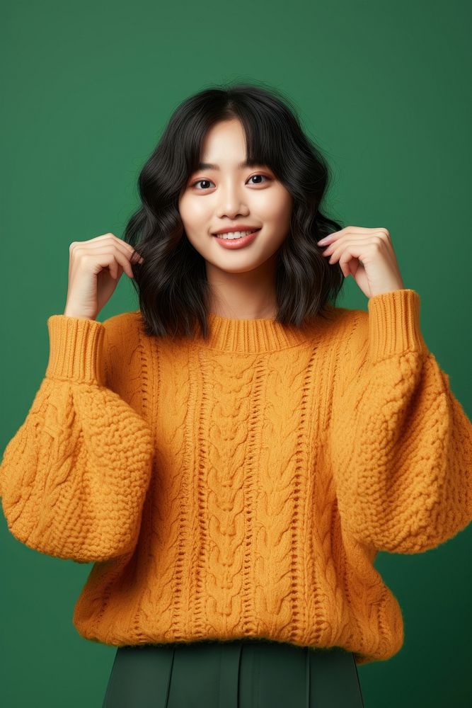 Asian girl sweater knitted hairstyle. AI generated Image by rawpixel.