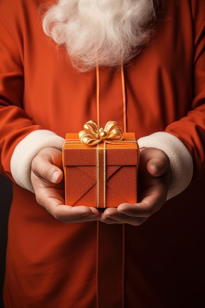 Santa claus hands a gift box celebration accessories decoration. AI generated Image by rawpixel.
