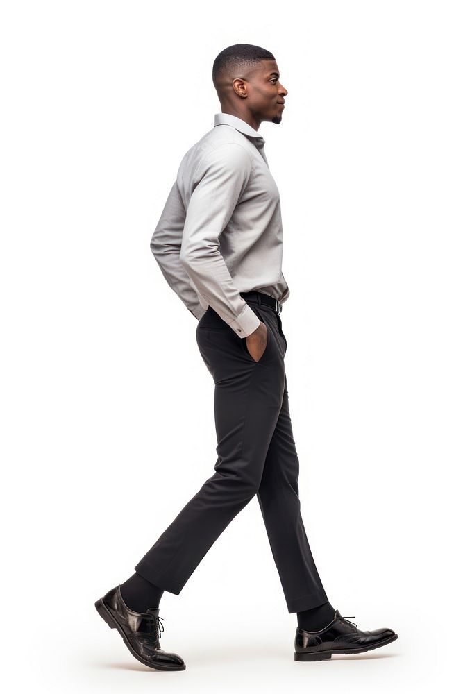 Black Confident successful smart casual businessman walking with hands in pockets footwear standing sleeve. AI generated…
