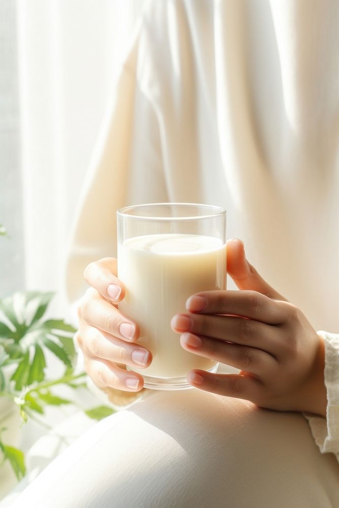 Soy milk holding dairy drink. AI generated Image by rawpixel.