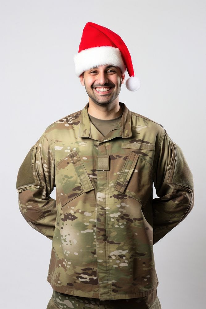 US Soldier wearing a christmas hat soldier military adult. AI generated Image by rawpixel.