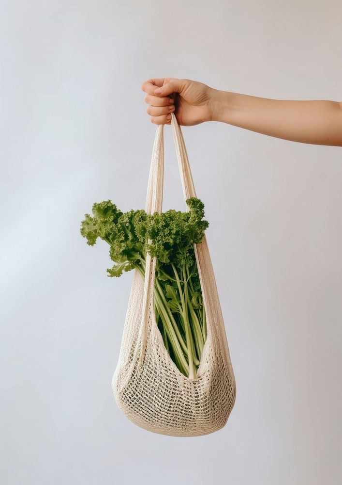 Bag vegetable holding green. AI generated Image by rawpixel.