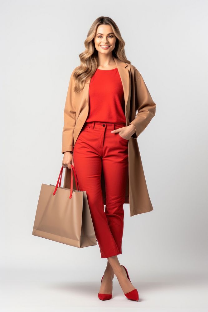 A woman holding a paper shopping bag handbag adult coat. AI generated Image by rawpixel.