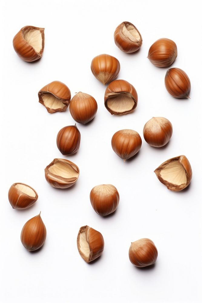 Falling cracked hazelnuts backgrounds plant food. AI generated Image by rawpixel.