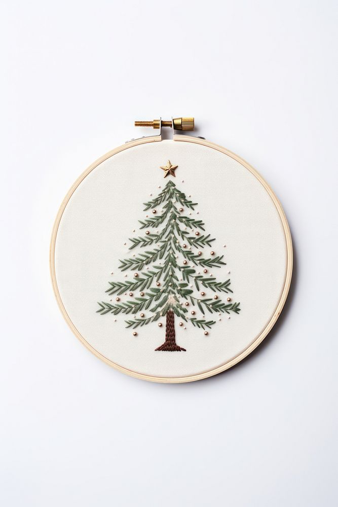 A christmas tree embroidery pattern white background celebration. AI generated Image by rawpixel.