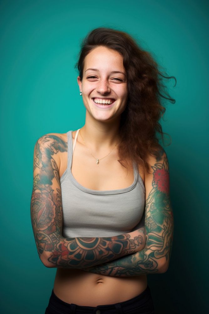 Young woman tattoo laughing portrait. AI generated Image by rawpixel.