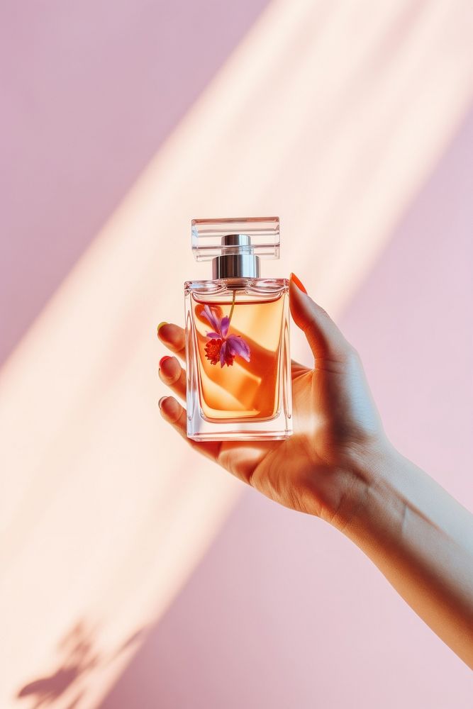 Hand holding perfume cosmetics bottle refreshment. AI generated Image by rawpixel.