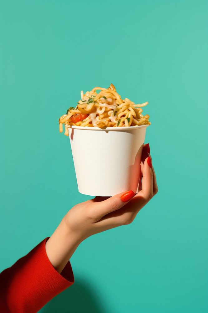 Hand holding takeaway noodle box adult food freshness. AI generated Image by rawpixel.
