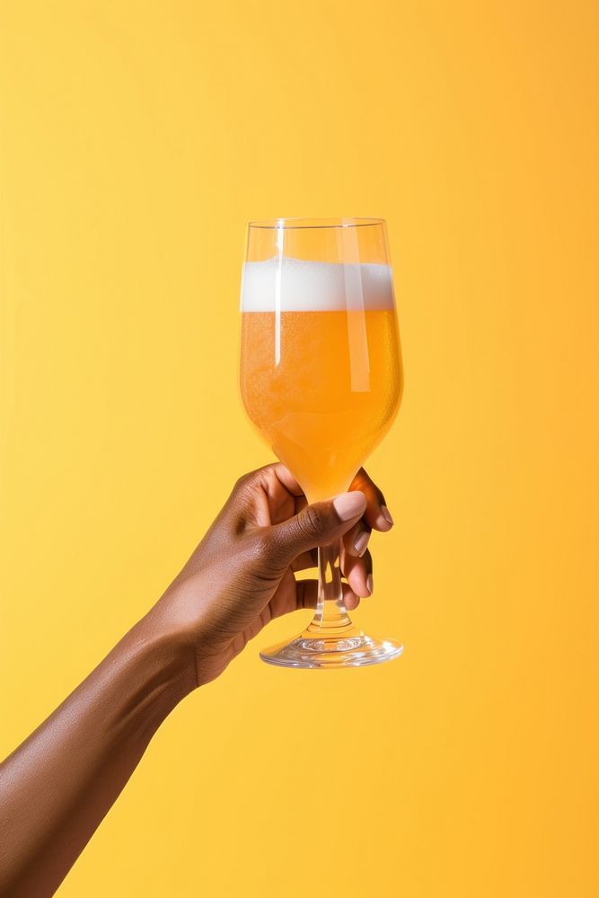 Hand holding beer glass drink adult refreshment. AI generated Image by rawpixel.
