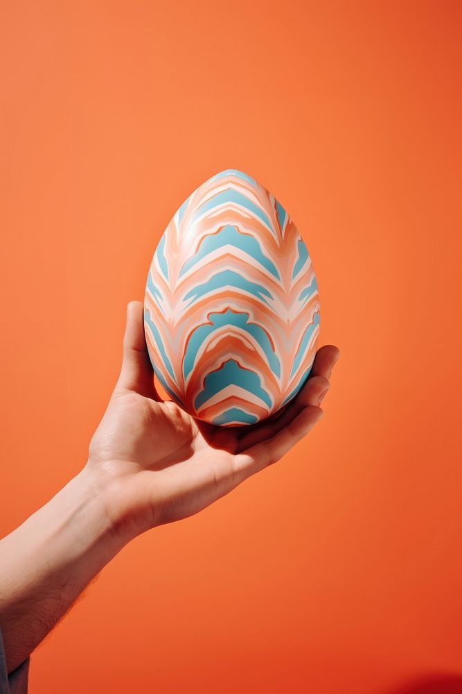 Hand holding easter egg ball creativity baseball. AI generated Image by rawpixel.
