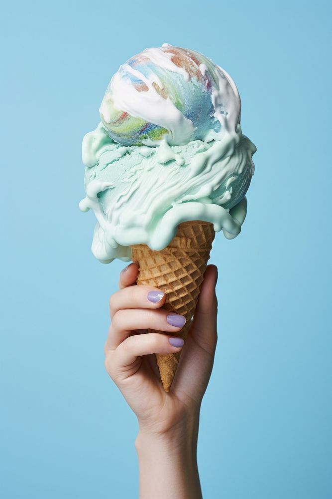 Hand holding melting earth icecream dessert food blue. AI generated Image by rawpixel.