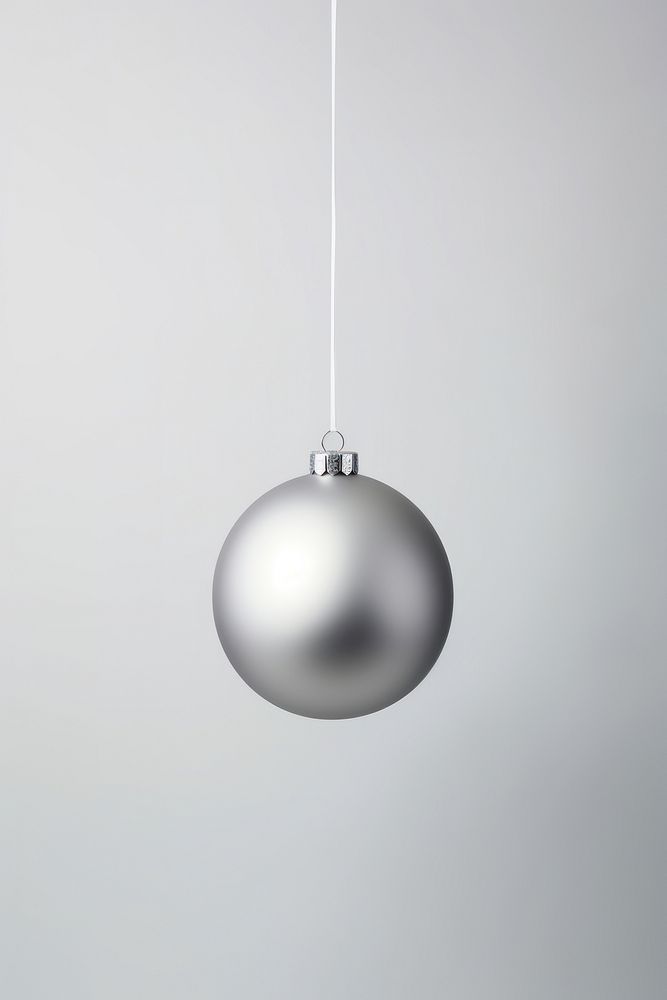 Color christmas ball jewelry hanging gray. AI generated Image by rawpixel.