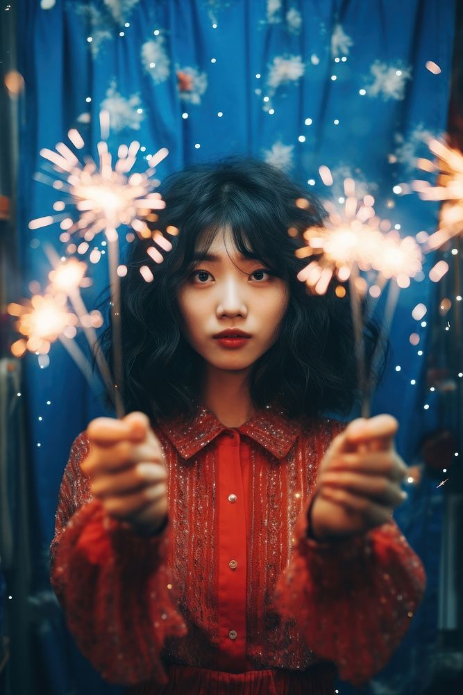Sparklers portrait holding sparks. AI generated Image by rawpixel.
