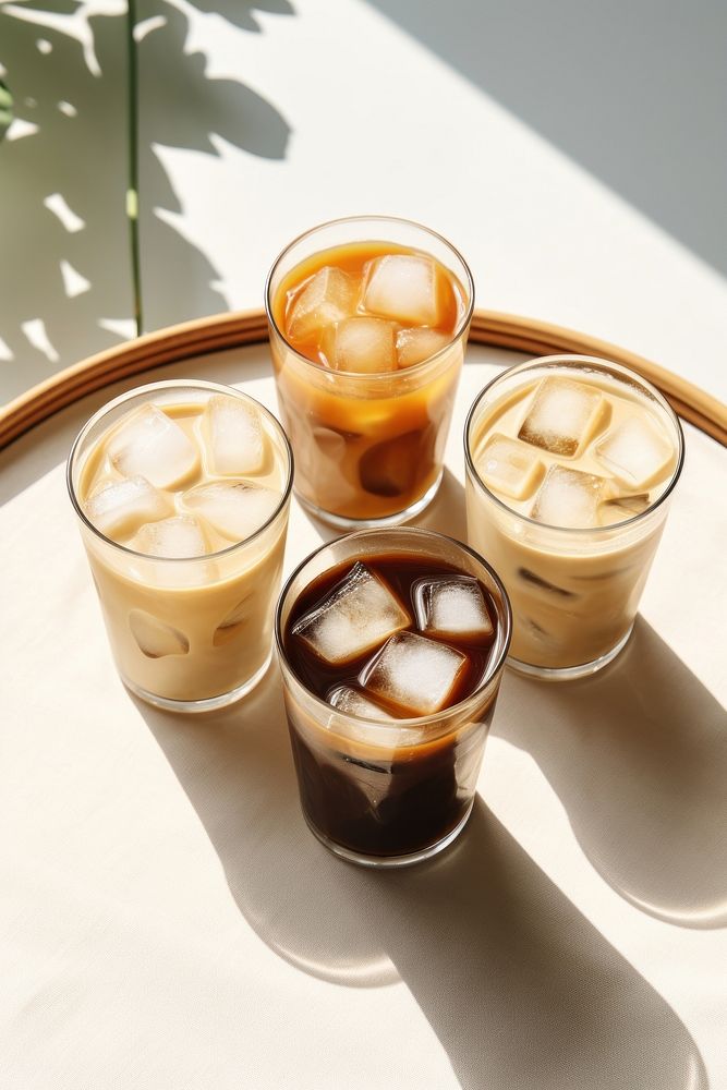 4 iced coffee drink table food. AI generated Image by rawpixel.