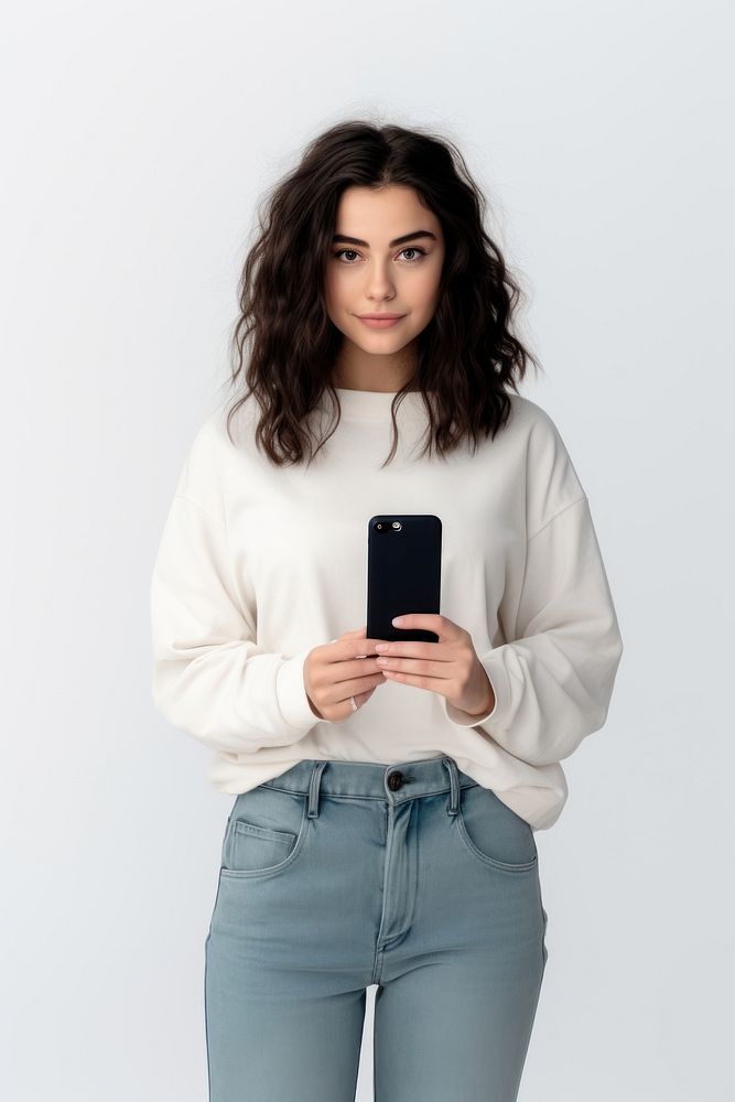 Woman holding smartphone standing sweater sleeve. AI generated Image by rawpixel.