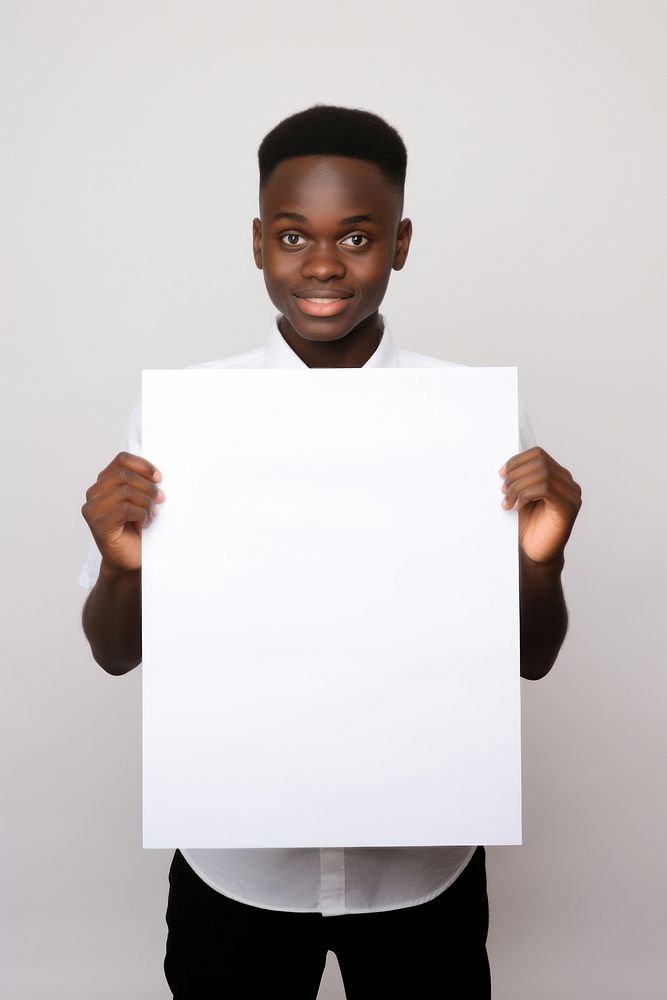 A african student boy portrait paper photo. AI generated Image by rawpixel.