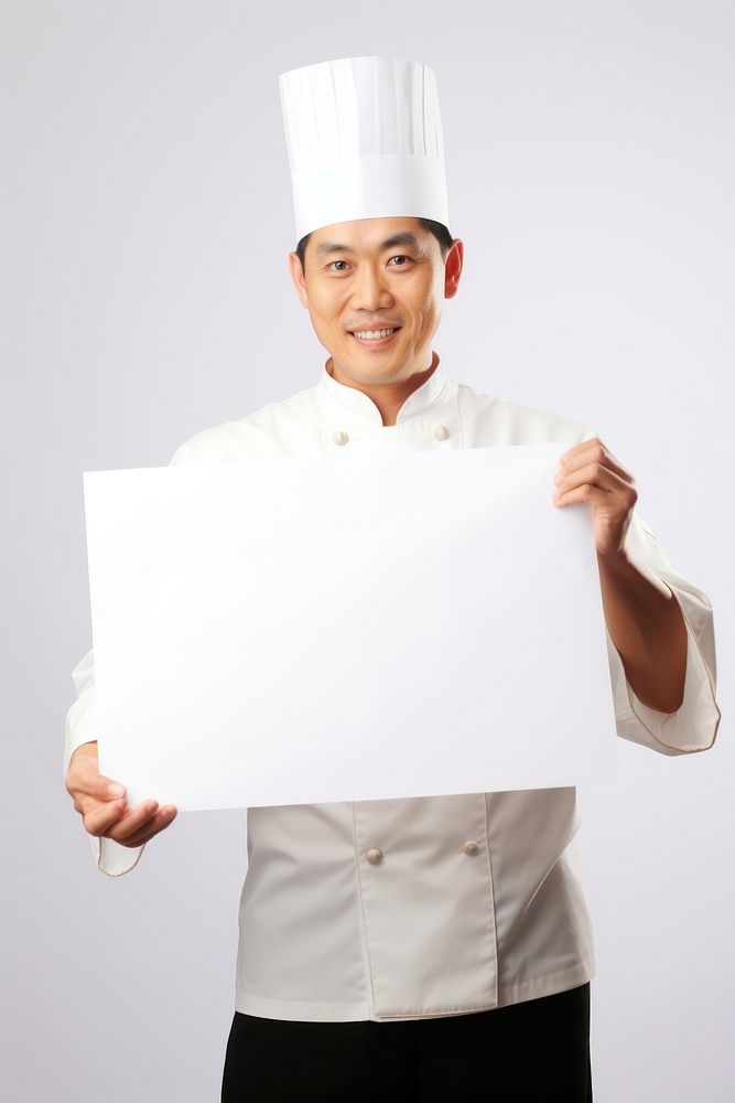 A asian chef in uniform man portrait holding adult. AI generated Image by rawpixel.
