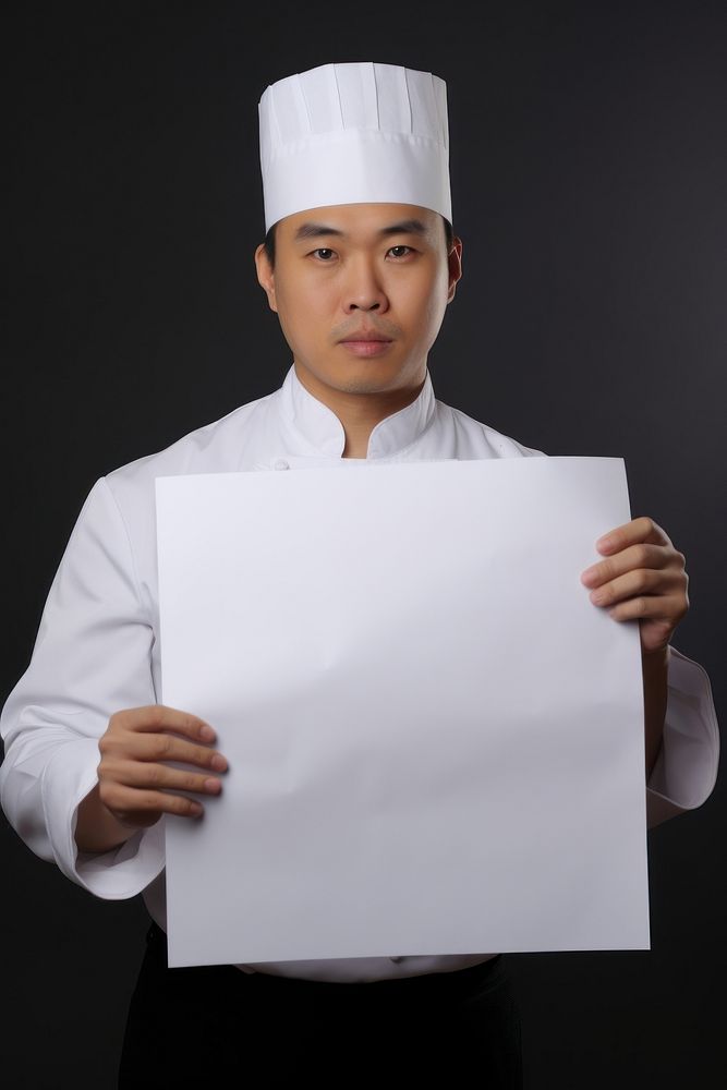 A asian chef in uniform man portrait holding paper. AI generated Image by rawpixel.