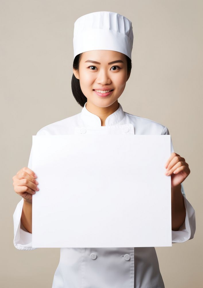 A asian chef woman portrait holding adult. AI generated Image by rawpixel.